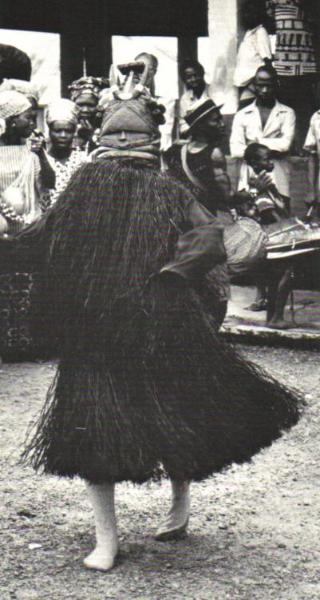Mende Sowei society mask and dancer